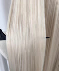 White Blonde Long Straight Lace Front Wig | Platinum White close-up of hair texture and sheen.