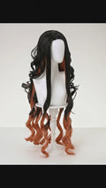 Demon Slayer Nezuko Kamado Cosplay Wig | Black to Burnt Orange Gradient Long Wavy displayed on a wig stand.